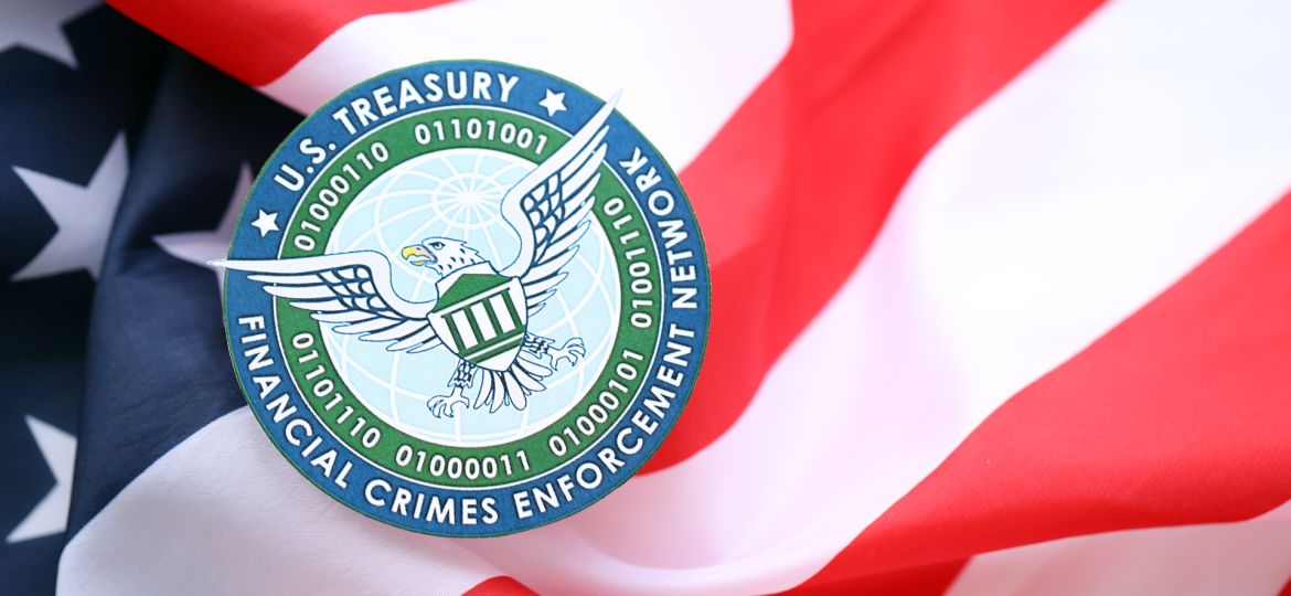 1920-kyiv-ukraine-june-26-2024-u-s-treasury-financial-crimes-enforcement-network-coat-of-arms-sticker-on-folded-us-flag